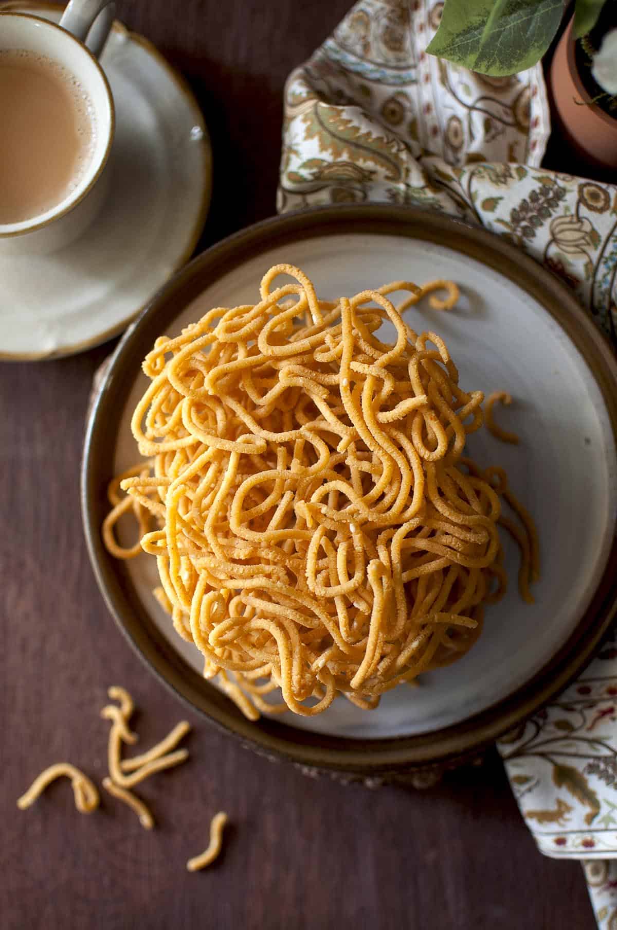 Top view of Brown plate with round murukku