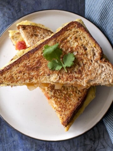 White plate with Bread Omelet halves