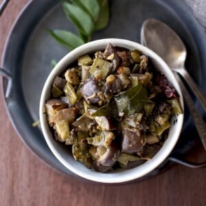 Eggplant broad beans curry in a white bowl