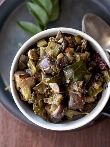 Eggplant broad beans curry in a white bowl