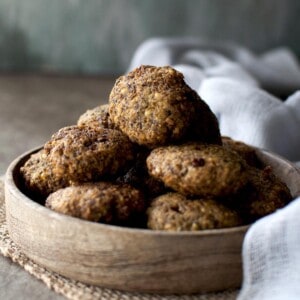 Wooden bowl with a stack of mung bean fritter