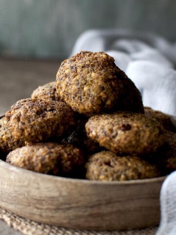 Wooden bowl with a stack of mung bean fritter