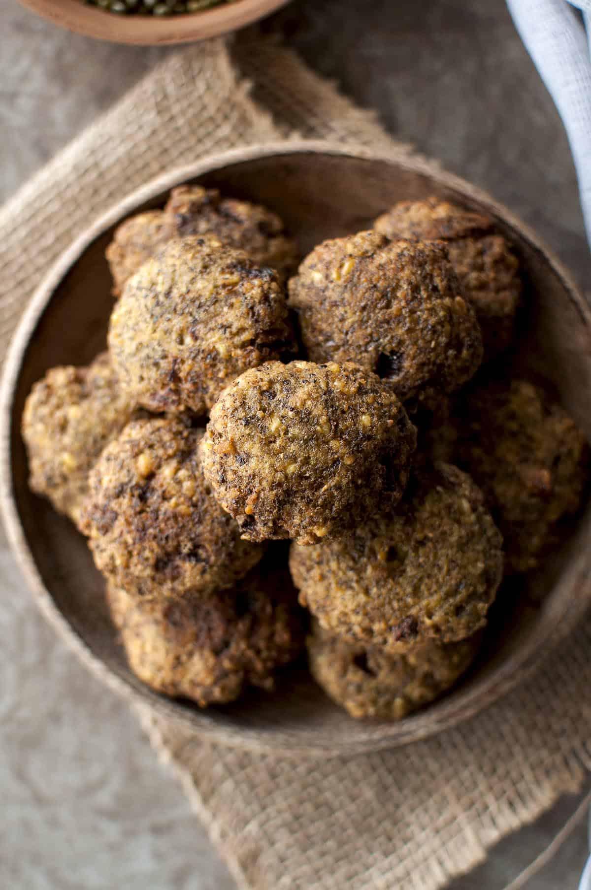 Top view of a stack of green moong vada