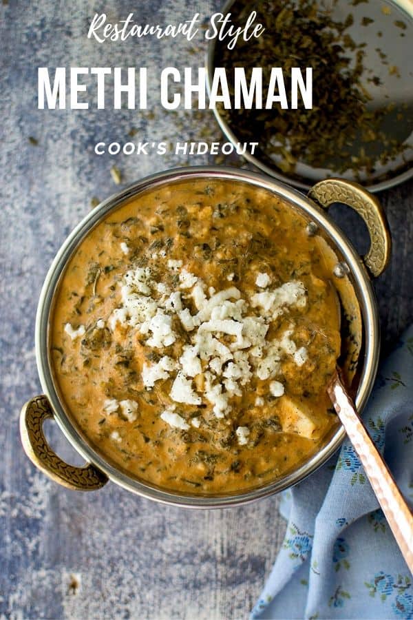 Steel Bowl with paneer and greens curry with a spoon