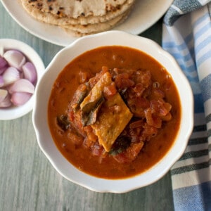 White bowl with billala pulusu.