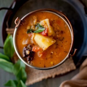 Top view of a bowl with slow cooker sambar