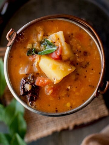 Top view of a bowl with slow cooker sambar