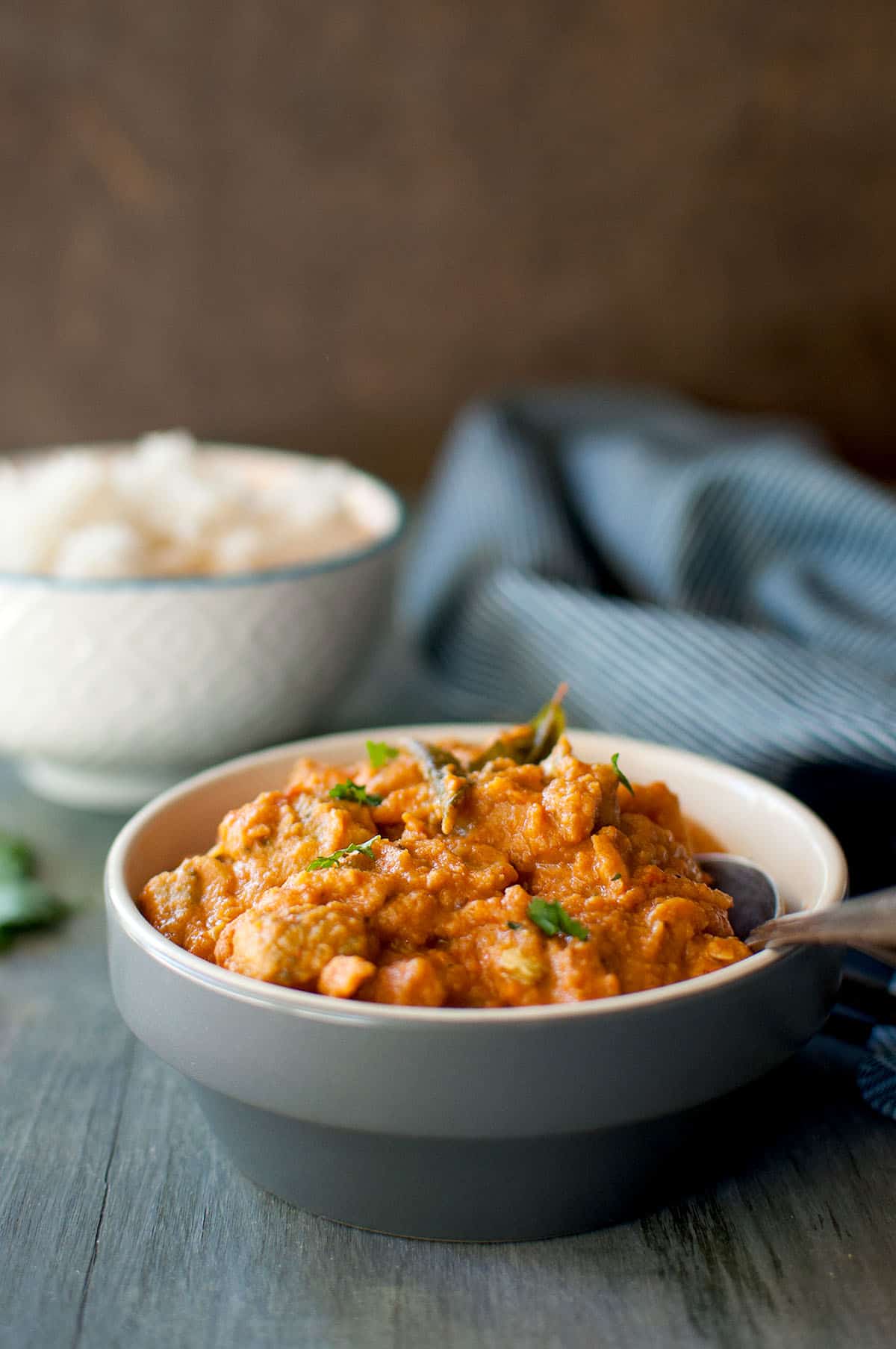 Grey bowl with karela masala.