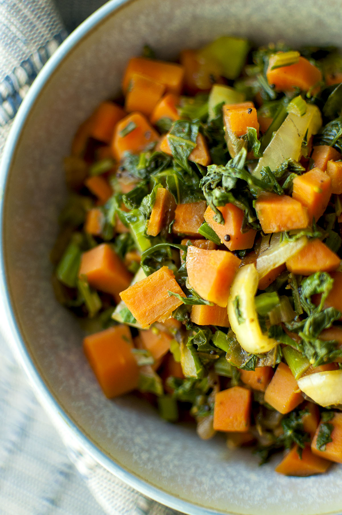 Close up view of a bowl with Indian bok choy.