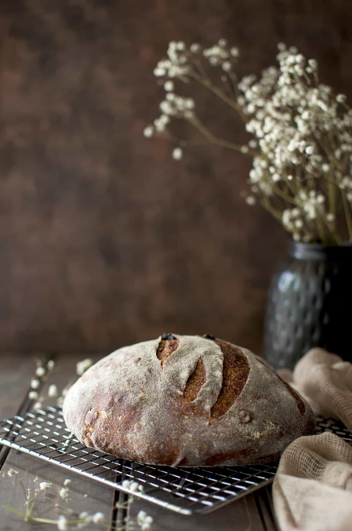 Wire rack with a boule of sourdough bread