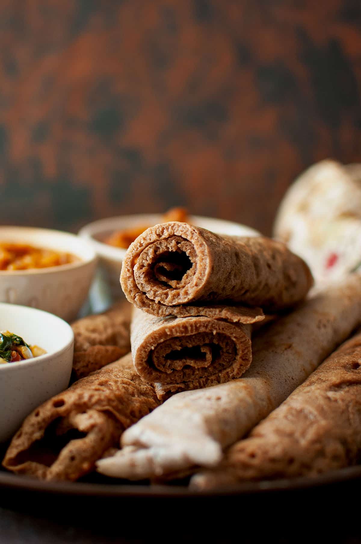 Front view of a rolled sourdough injera bread.