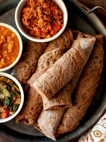 Top view of a tray wit Ethiopian bread.