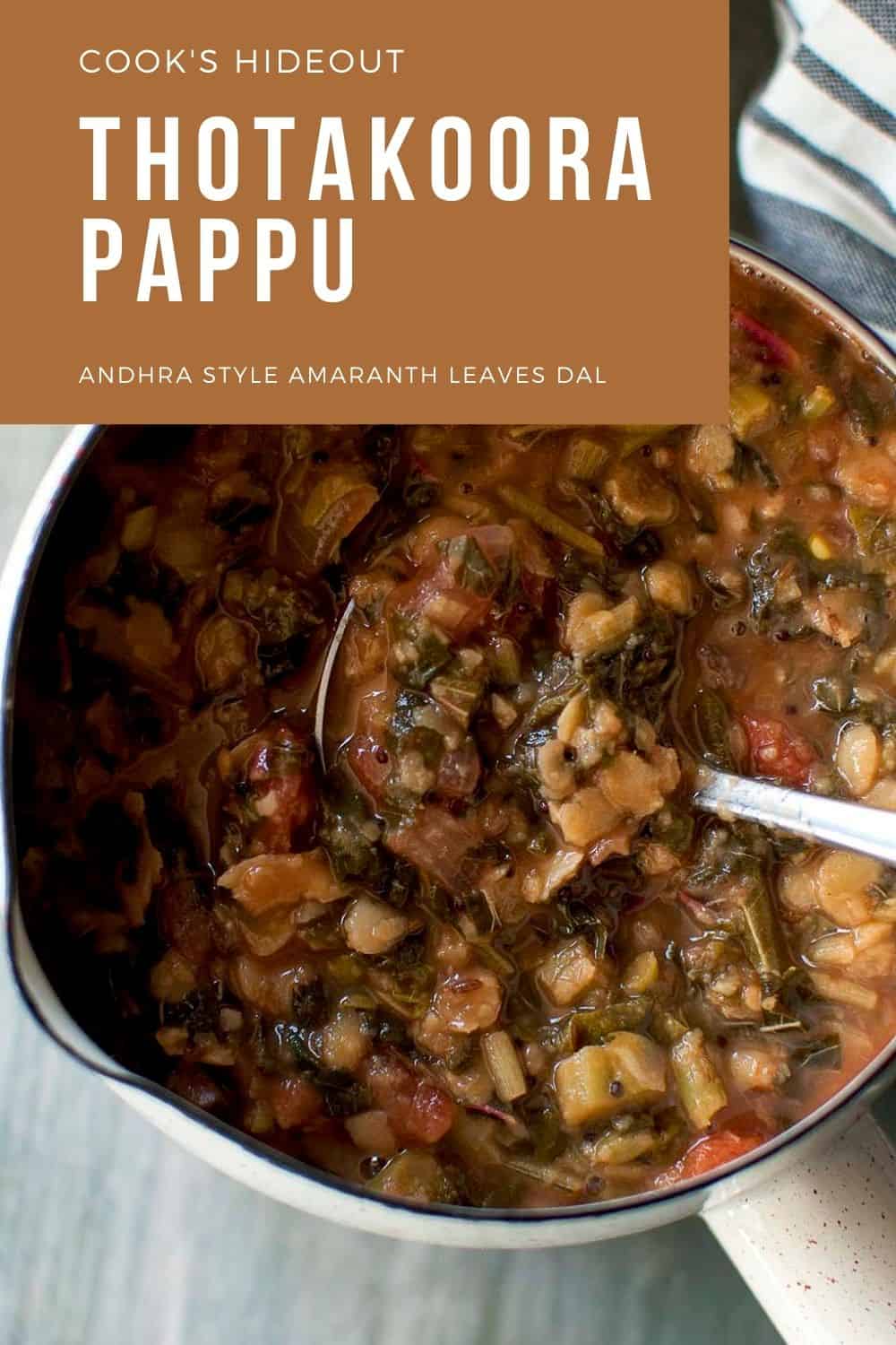 Top view of an enamel pan with amaranth leaves dal