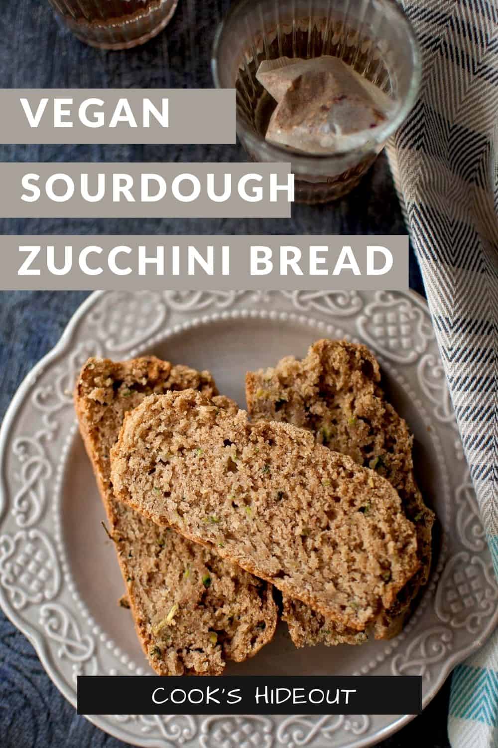 Grey plate with slices of sourdough zucchini bread