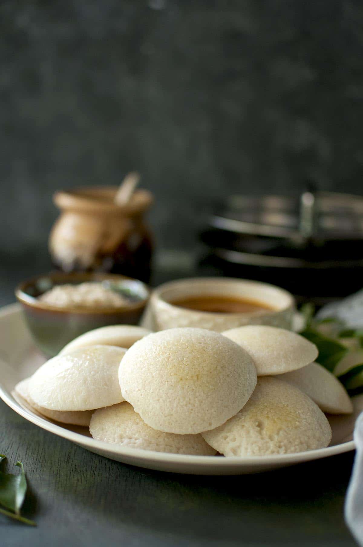 White plate with a stack of Idli