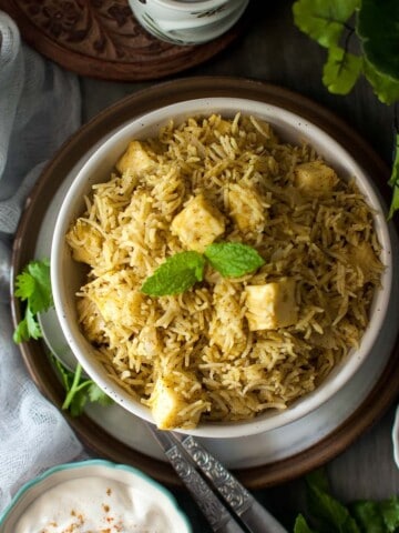 White bowl with Instant pot paneer rice