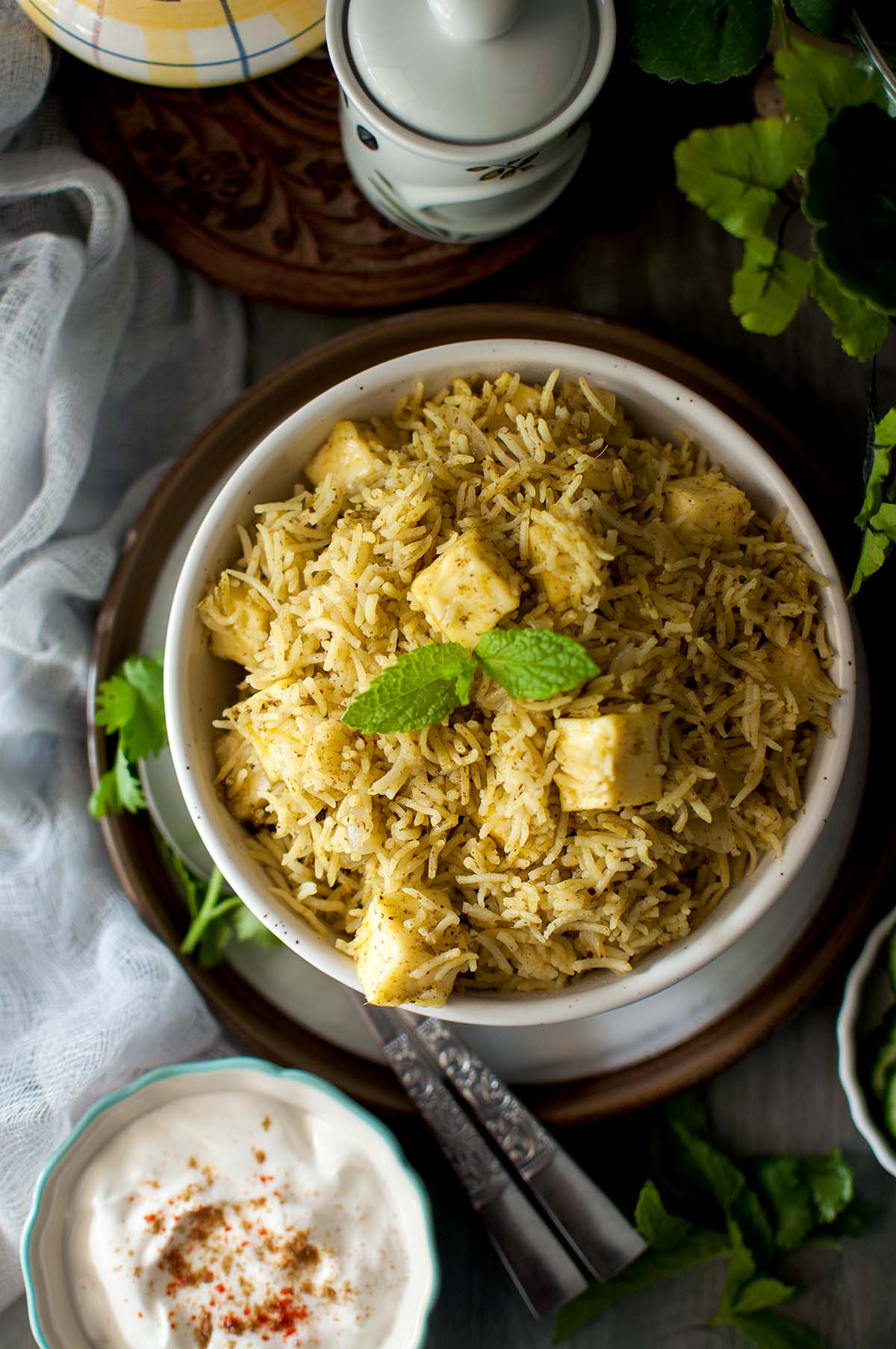 Top view of a white bowl with Paneer Pulao