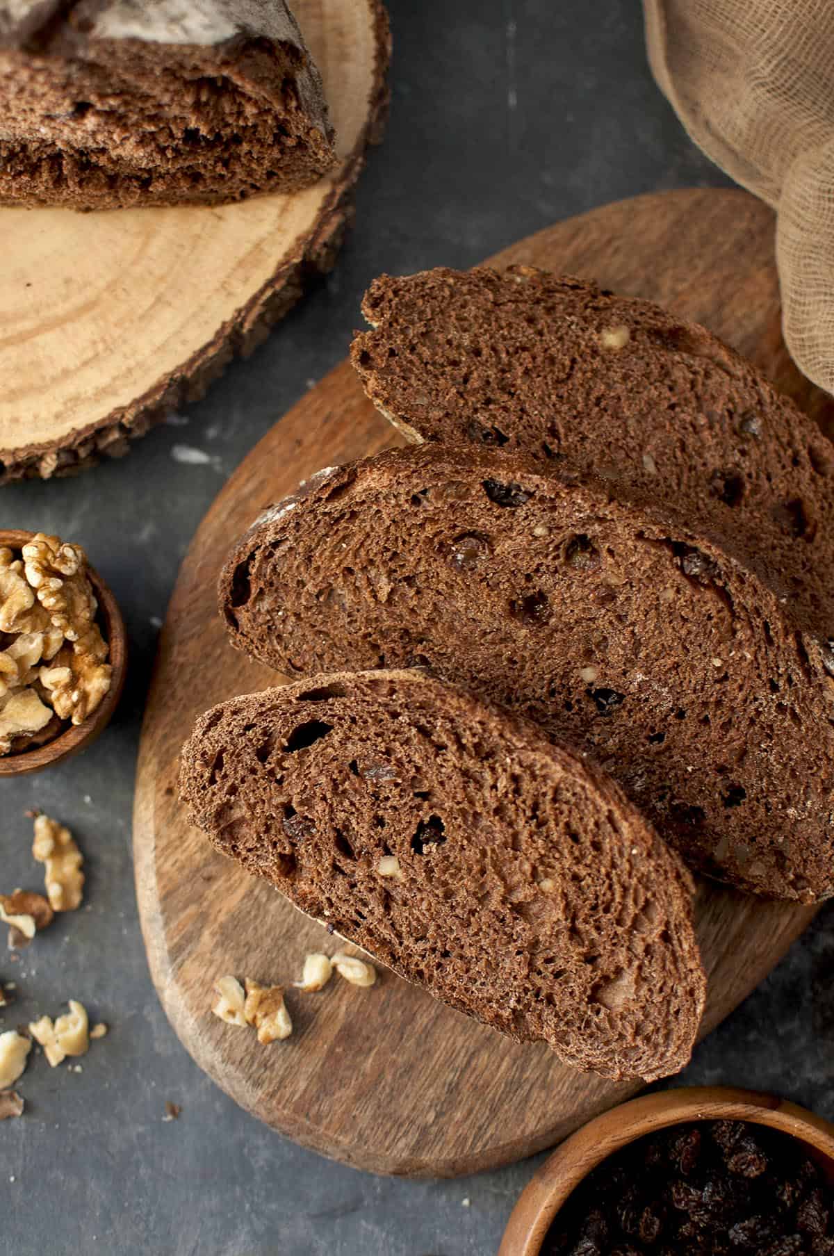 top view of a chopping board with slices of sourdough chocolate bread