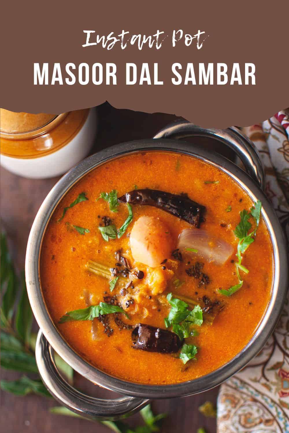 Steel bowl with masoor dal sambar.