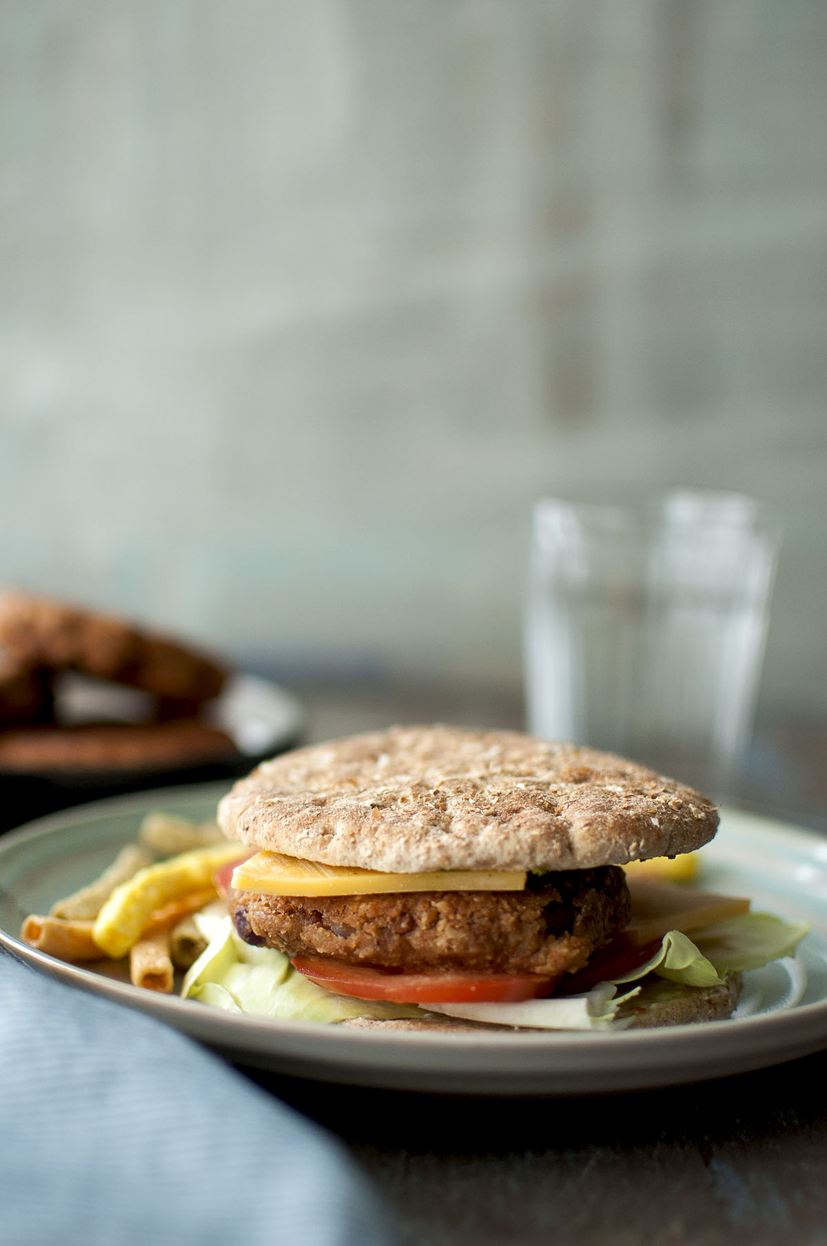 Plate with sandwich with refried bean burger