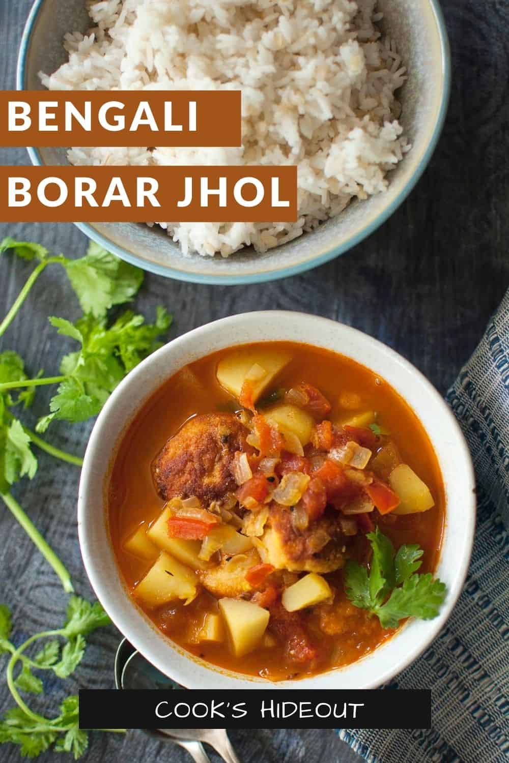 White bowl with Bora'r Jhol and a bowl of rice in the background