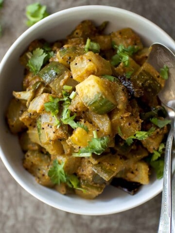 White bowl with cucumber chutney