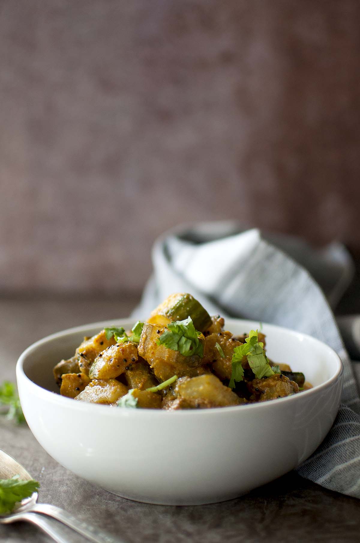 White bowl with cucumber chutney