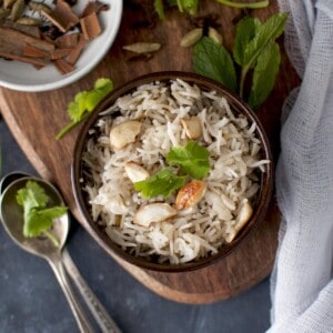 Brown bowl with Hyderabad style bagara rice