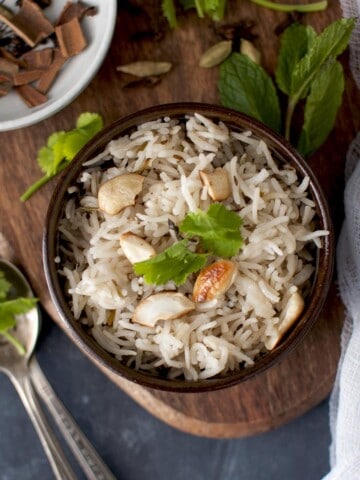 Brown bowl with Hyderabad style bagara rice