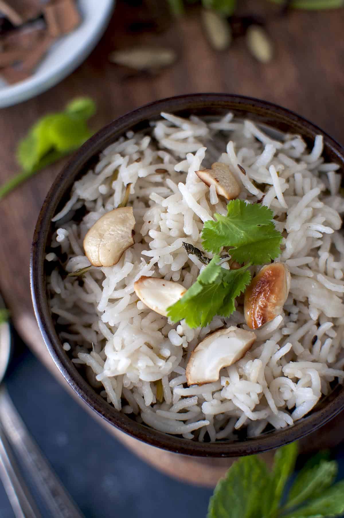 Top view of brown bowl with baghara rice