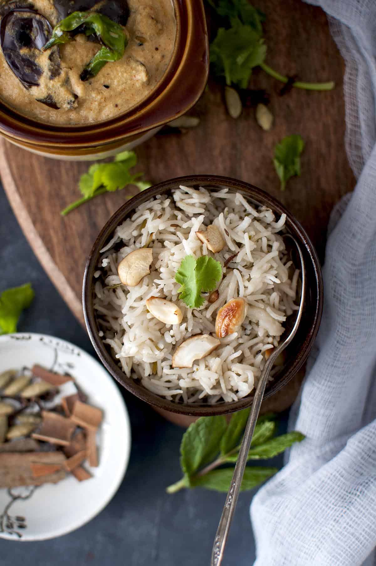 Brown bowl with Hyderabad style bagara rice