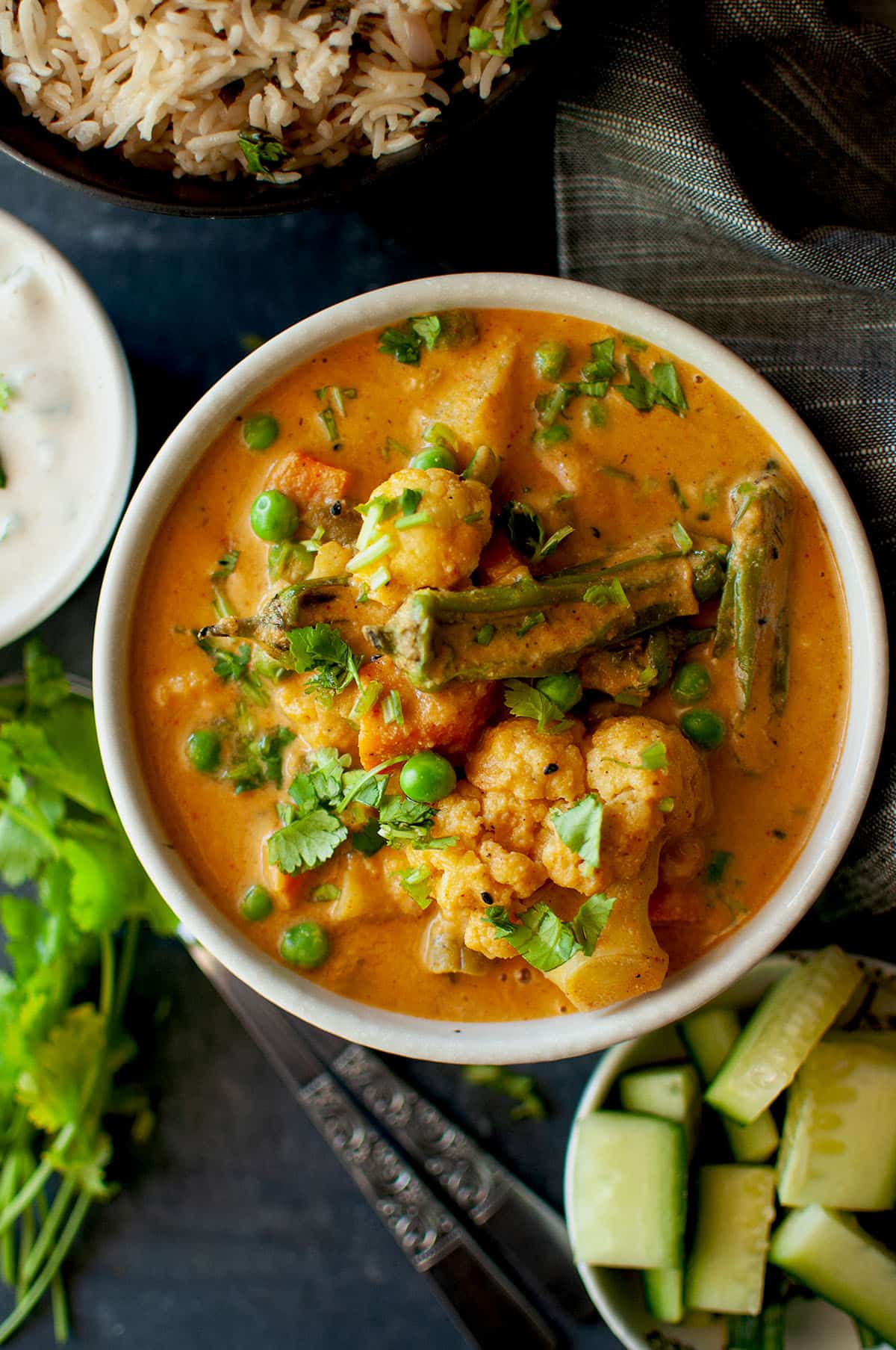 White bowl with mix vegetable salan.