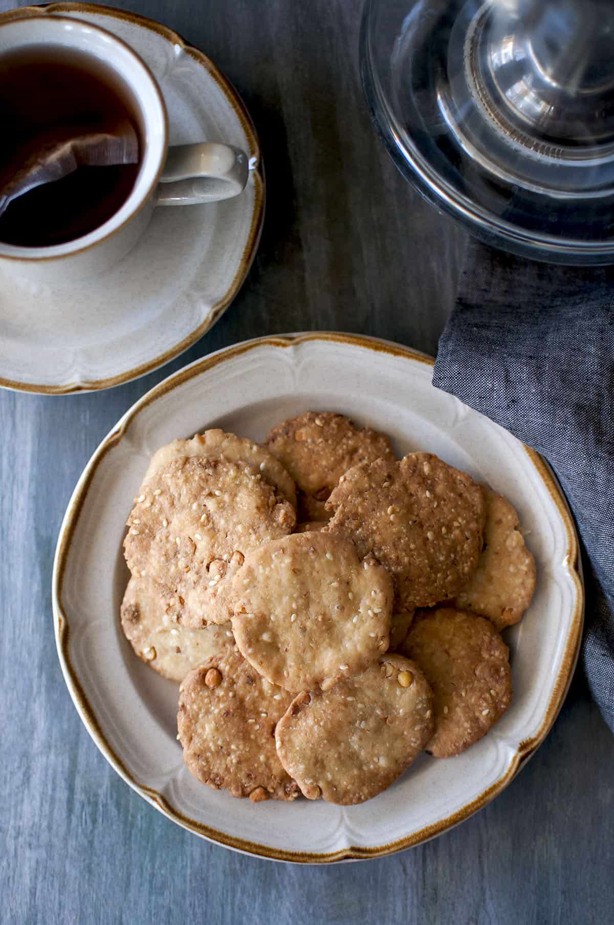 Light brown plate a stack of pappu chekkalu