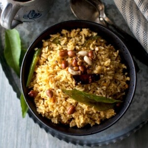 Raw mango rice in black bowl