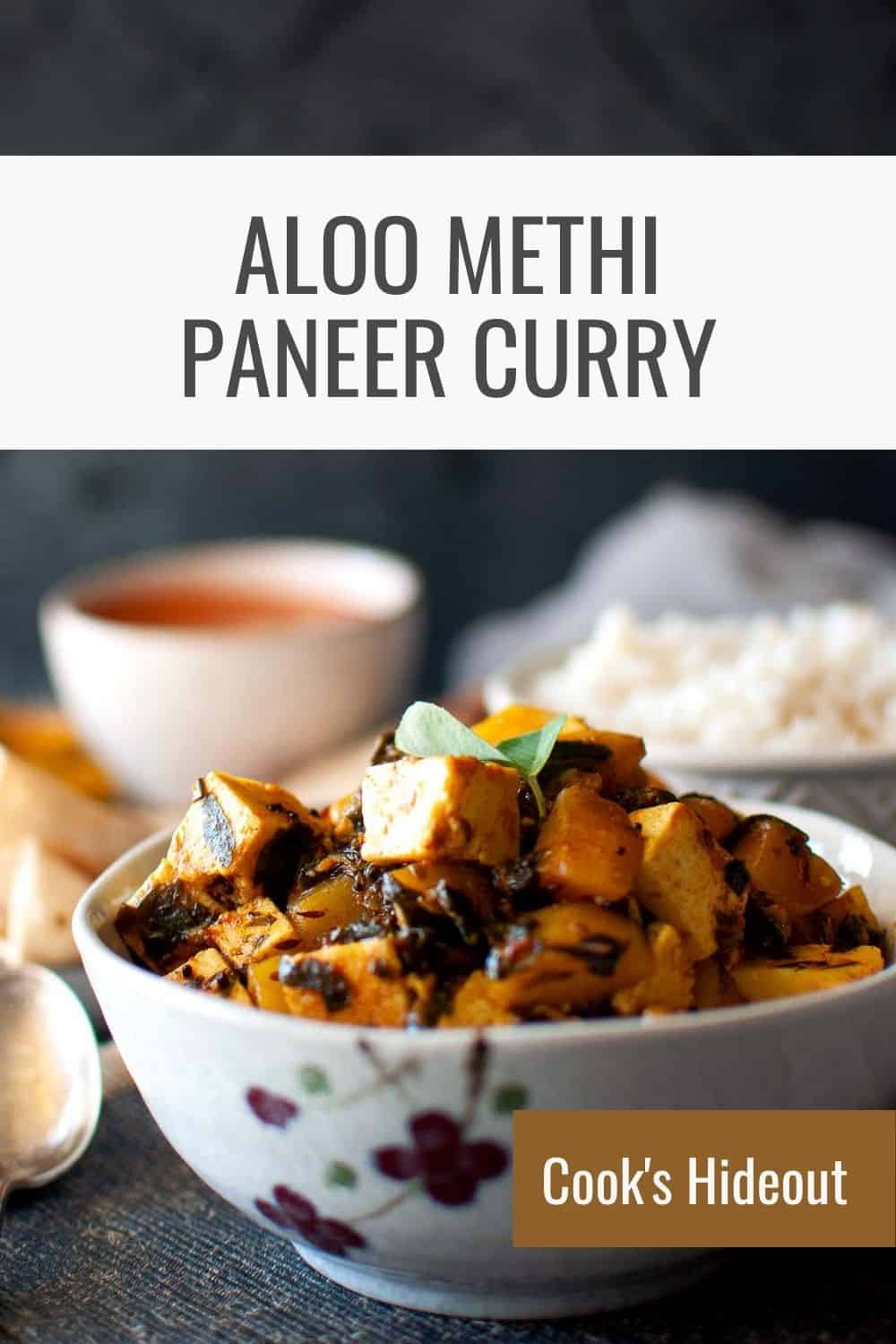 Grey bowl with aloo methi paneer ki sabji.