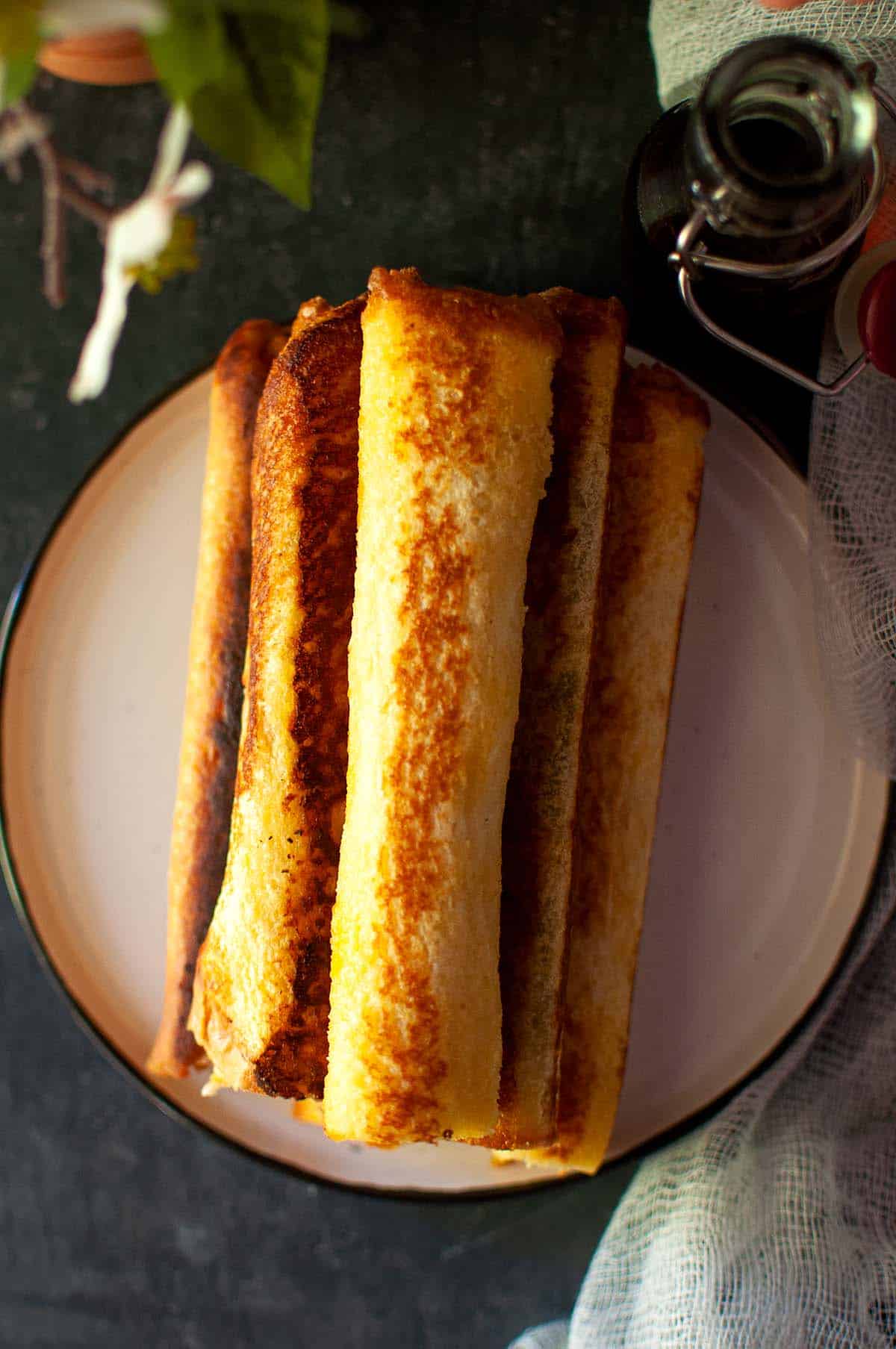 White plate with a stack of Nutella roll ups