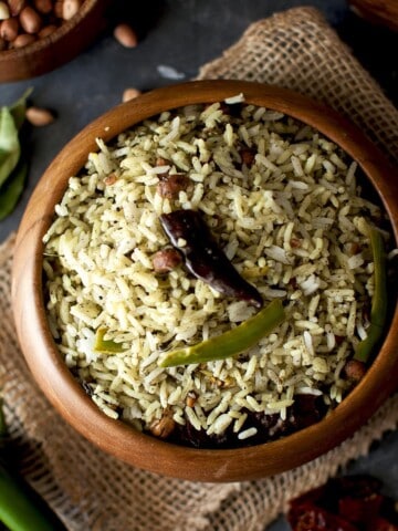 Top view of wooden bowl with gongura pulihora