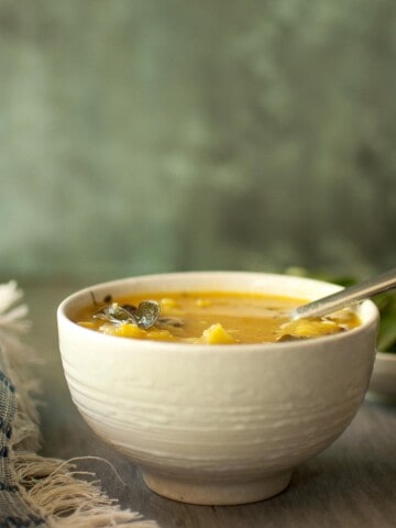 Mamidikaya pappu in a white bowl