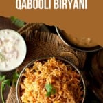 Top view of a bowl with chana dal biryani with a spoon.