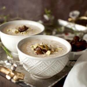 2 bowls of sheer khurma on a silver tray