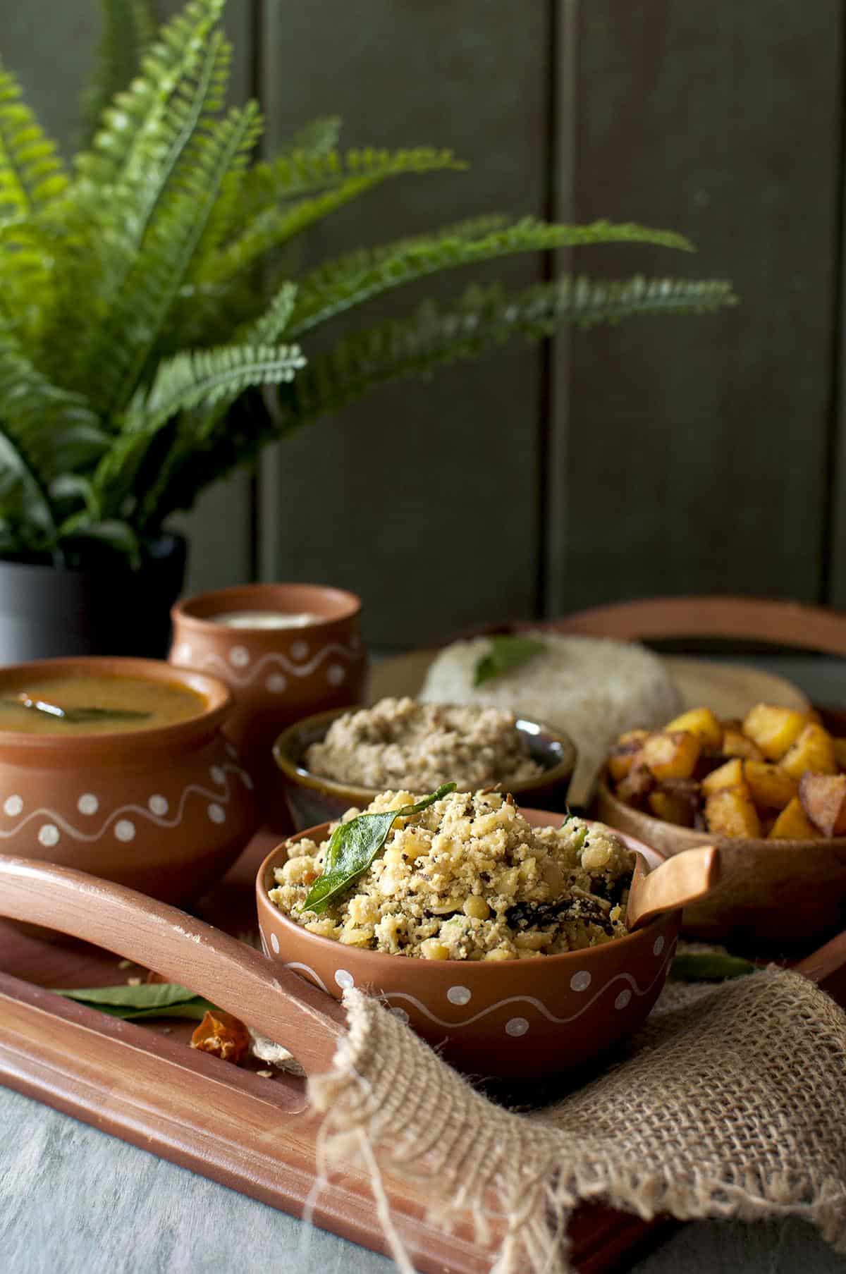 wooden tray with an Andhra style meal