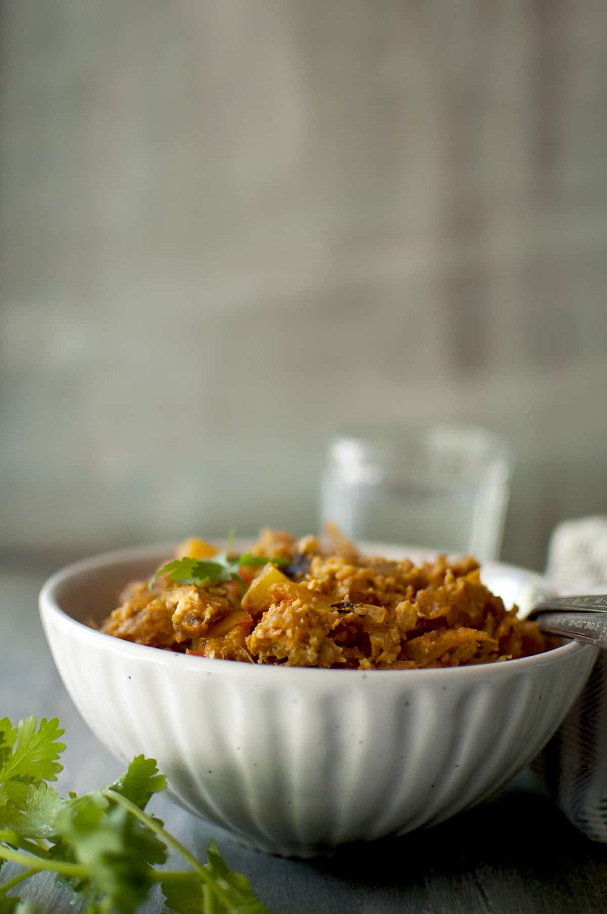 White bowl with Chilli Parotta.