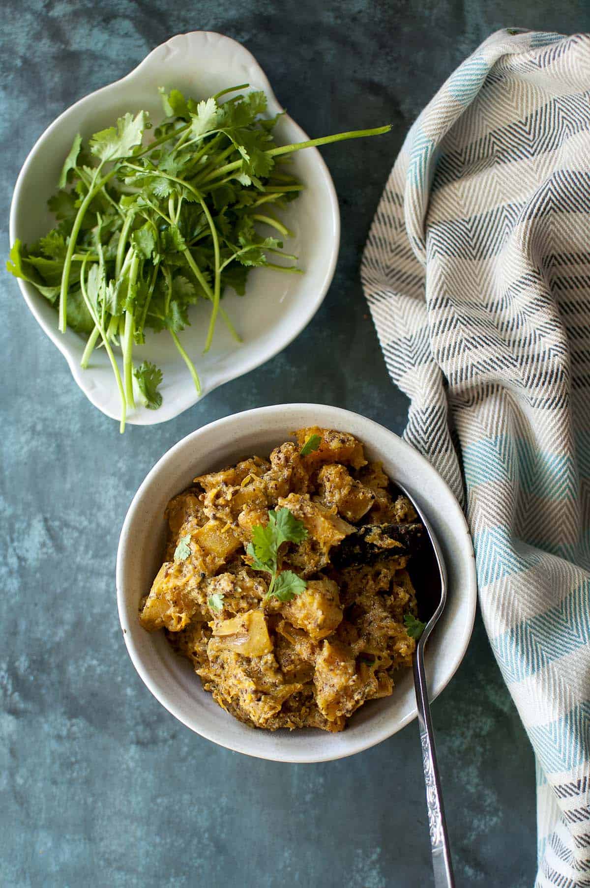 White bowl with pumkin ki sabzi