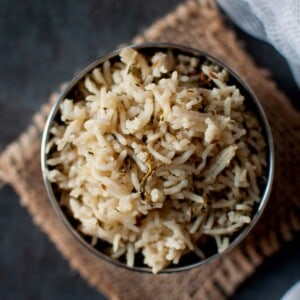 Steel bowl with spinach pulao