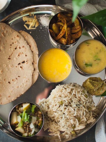 steel thali with Ayurvedic recipes