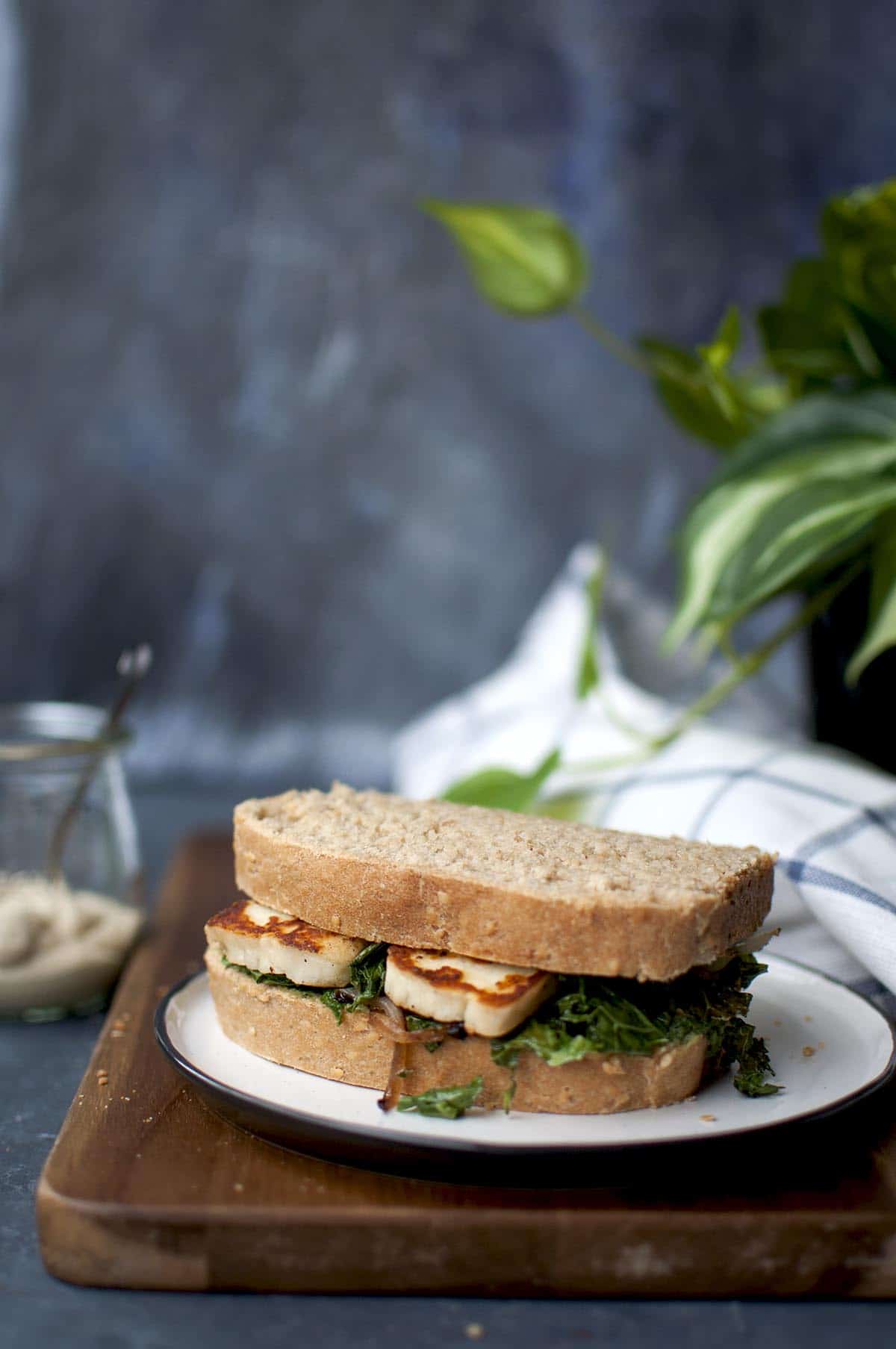 White plate with halloumi sandwich