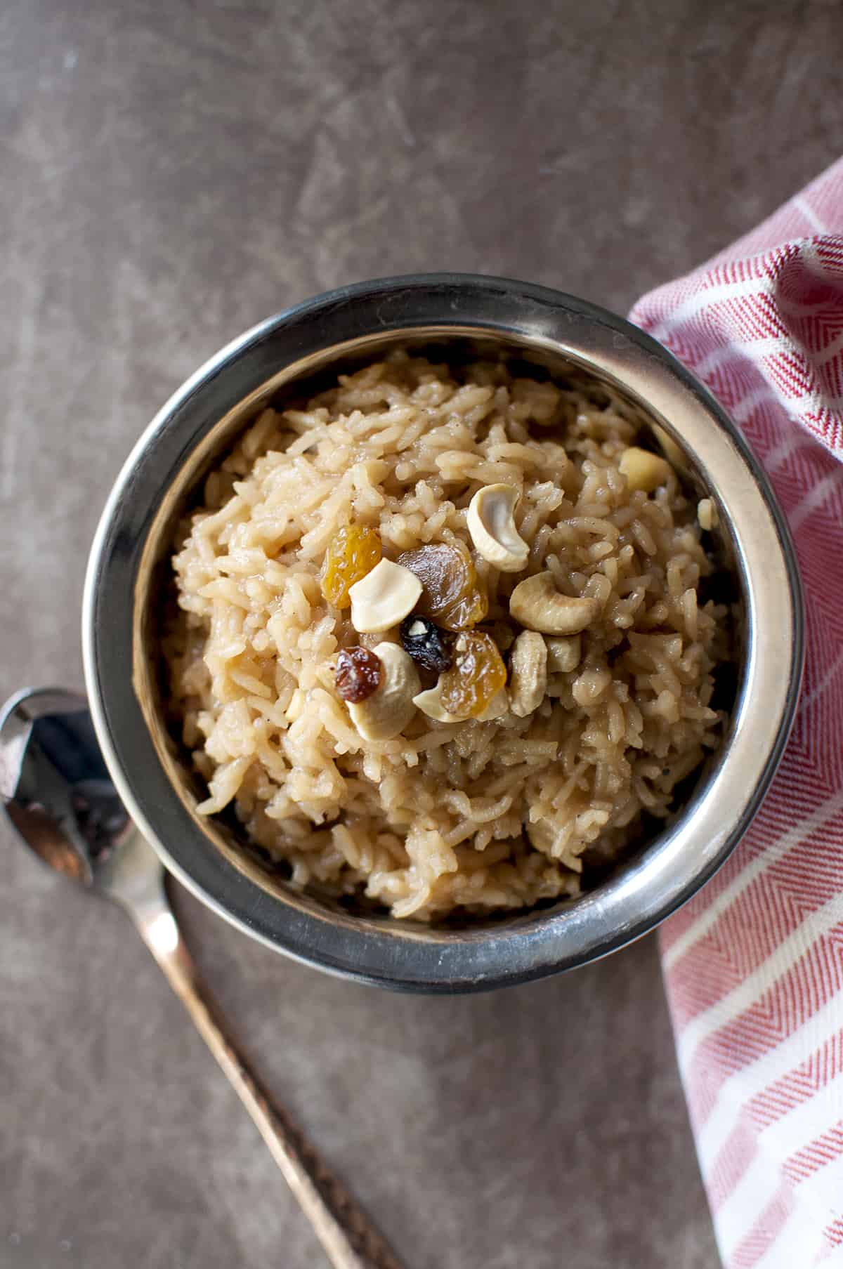 Steel bowl with bellam payasam.