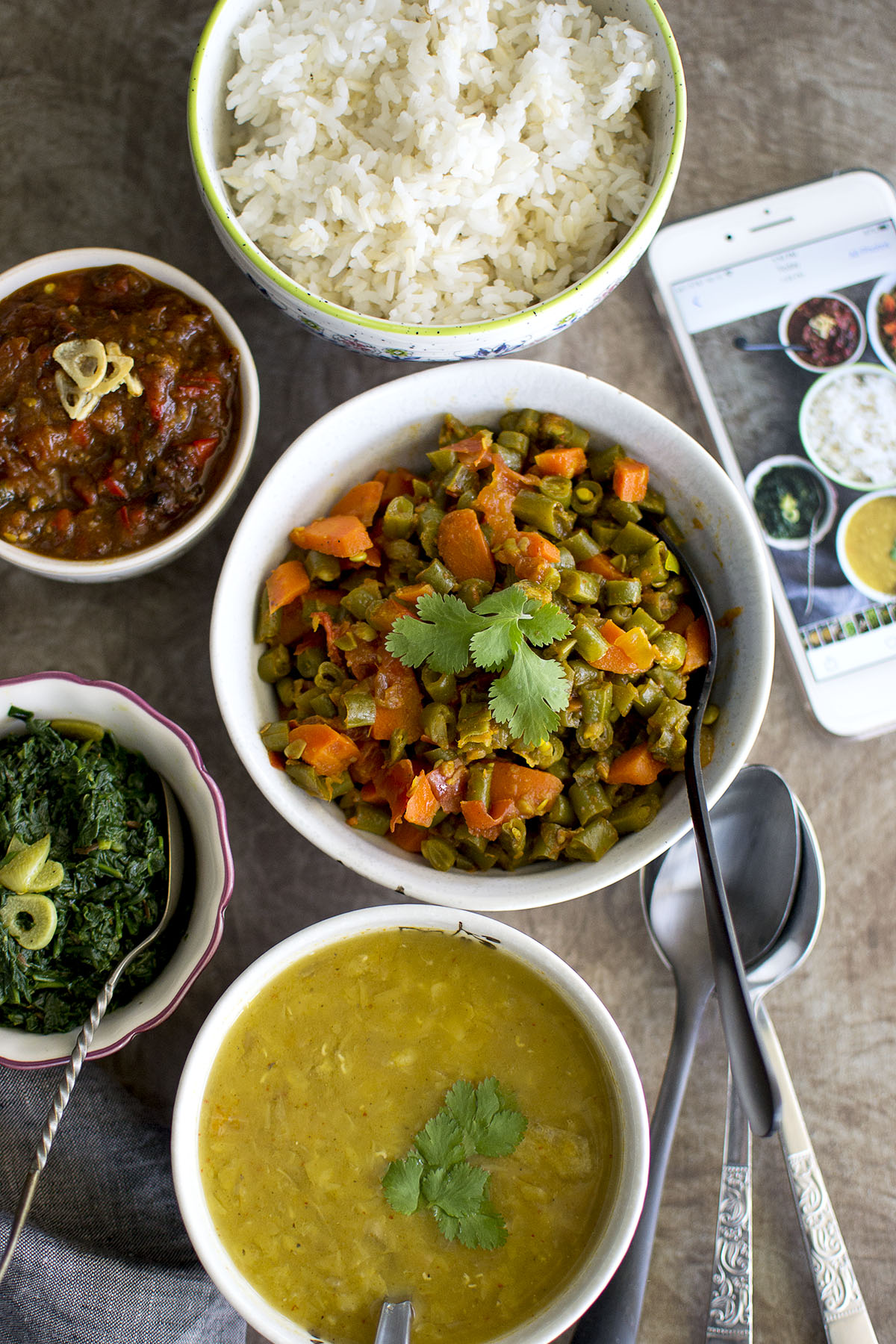 Rice, Mixed vegetable curry, dal, spinach, tomato chutney