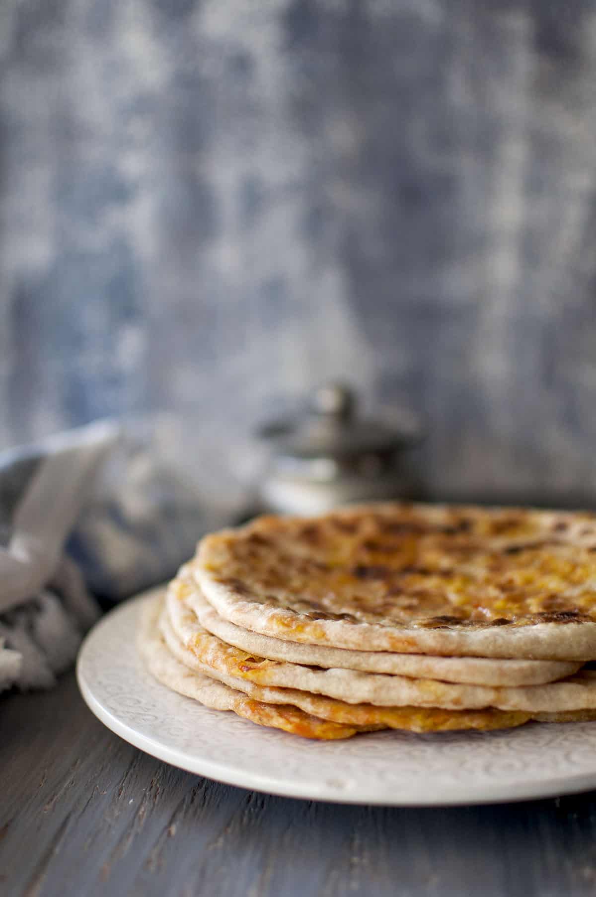 Grey plate with stack of carrot poli