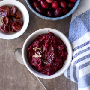 Top view of a white bowl with cranberry pachadi